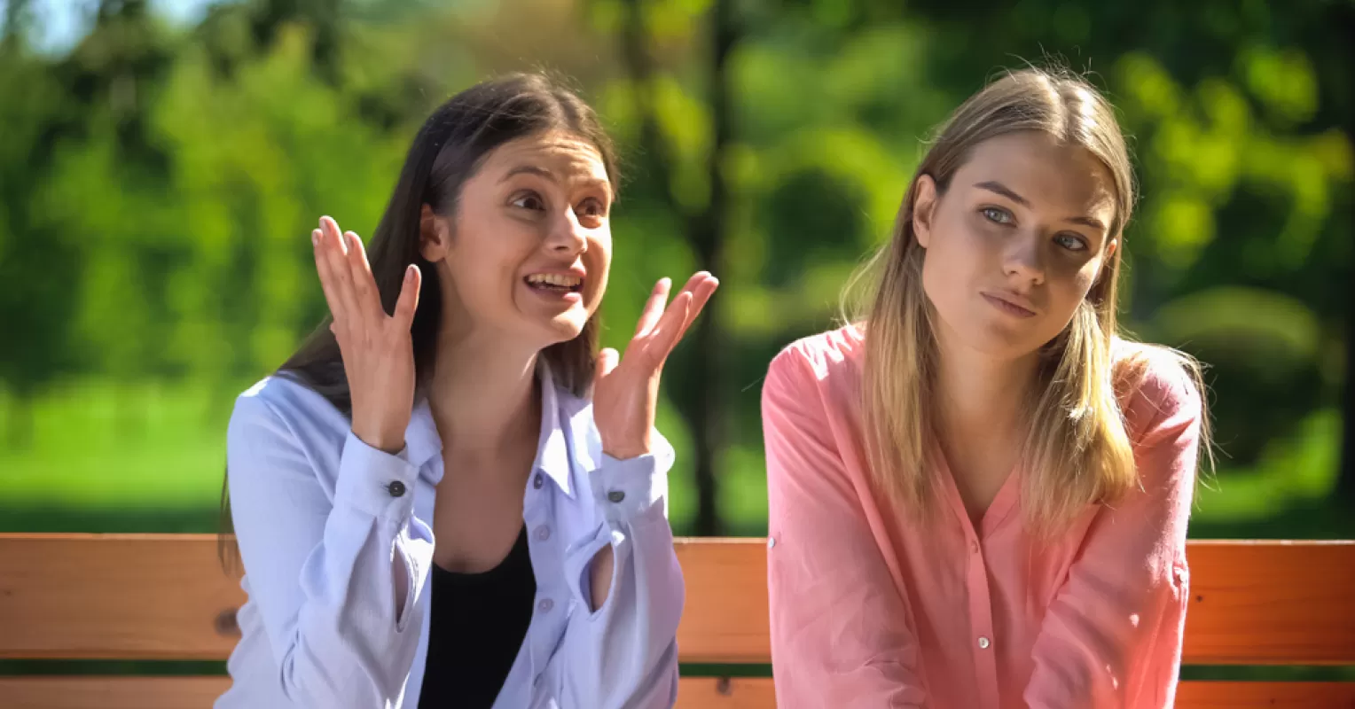 Individual feeling overwhelmed in a social setting, reflecting on what it means to be socially anxious
