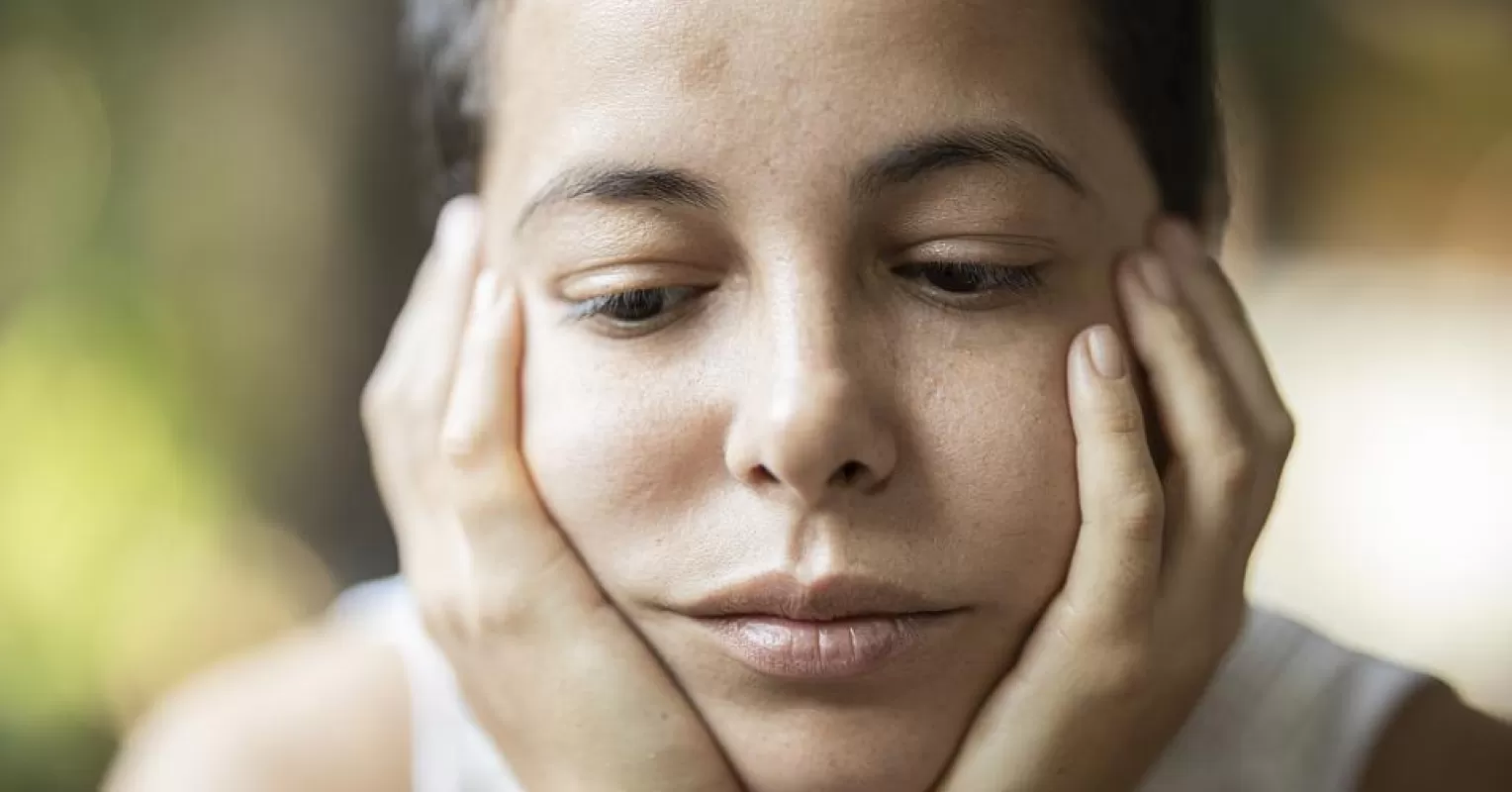 Person reflecting on emotional behavior and meaning connected to what does it mean to feel marginalized