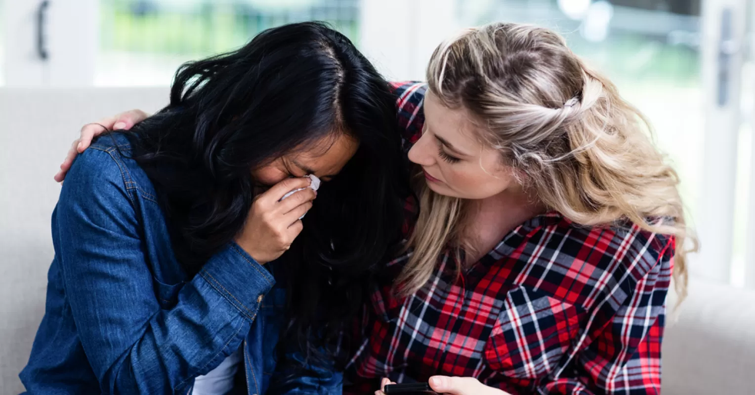 Individual expressing overwhelming emotions, illustrating the concept of trauma dumping in relationships