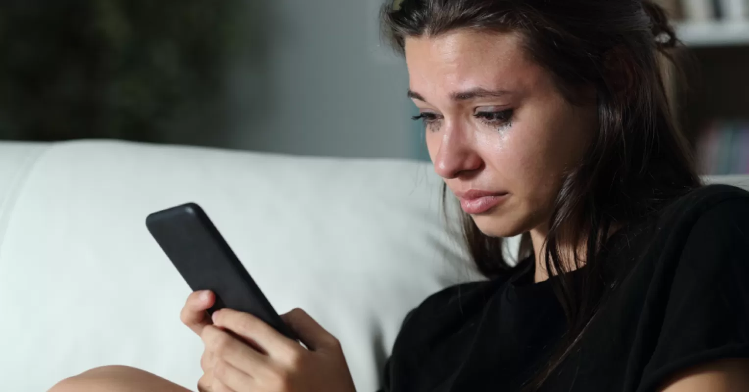 Person reflecting on emotional behavior and meaning connected to why do breakups hurt so much