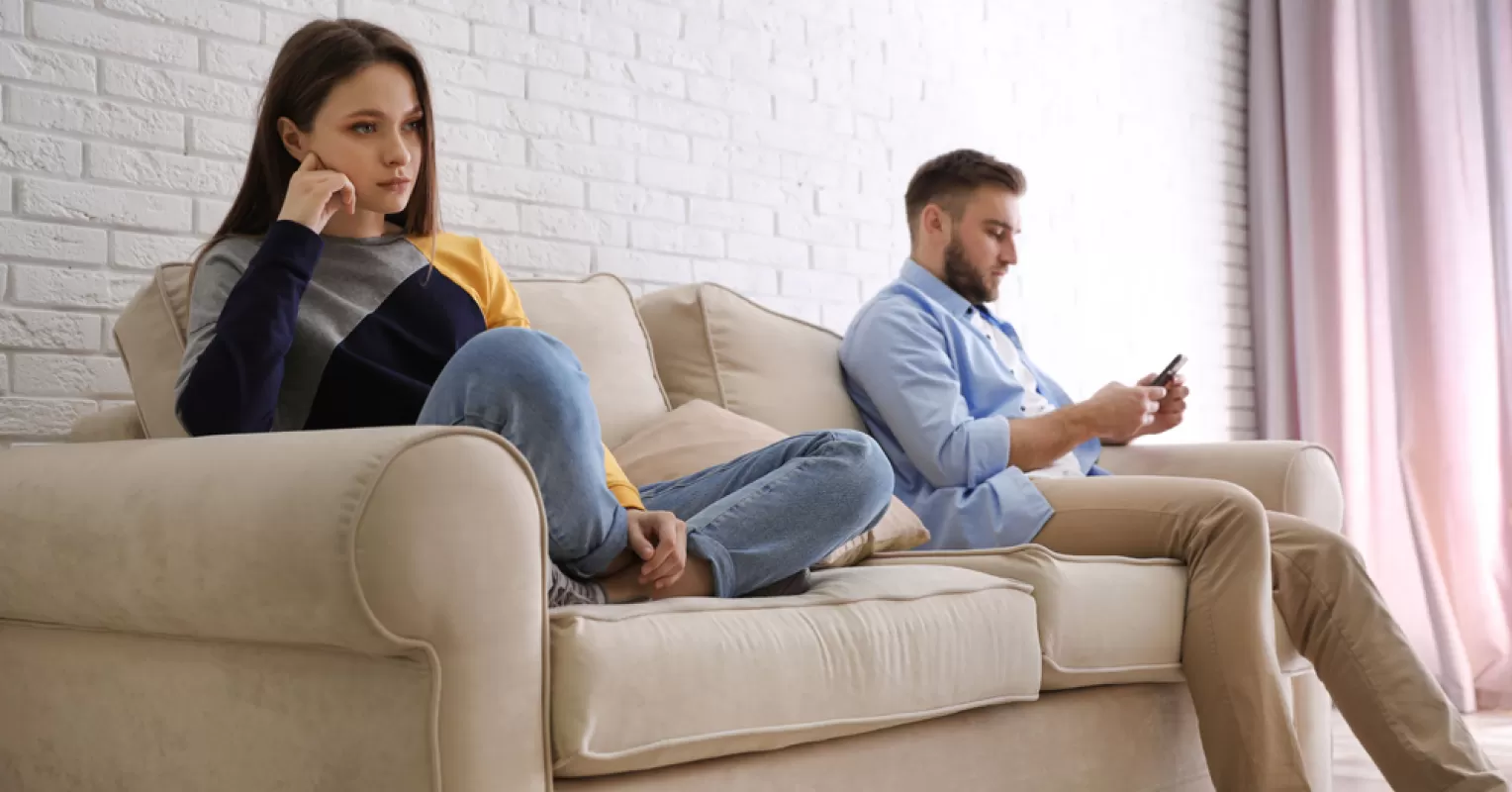 Individual contemplating guilt while establishing personal boundaries in relationships