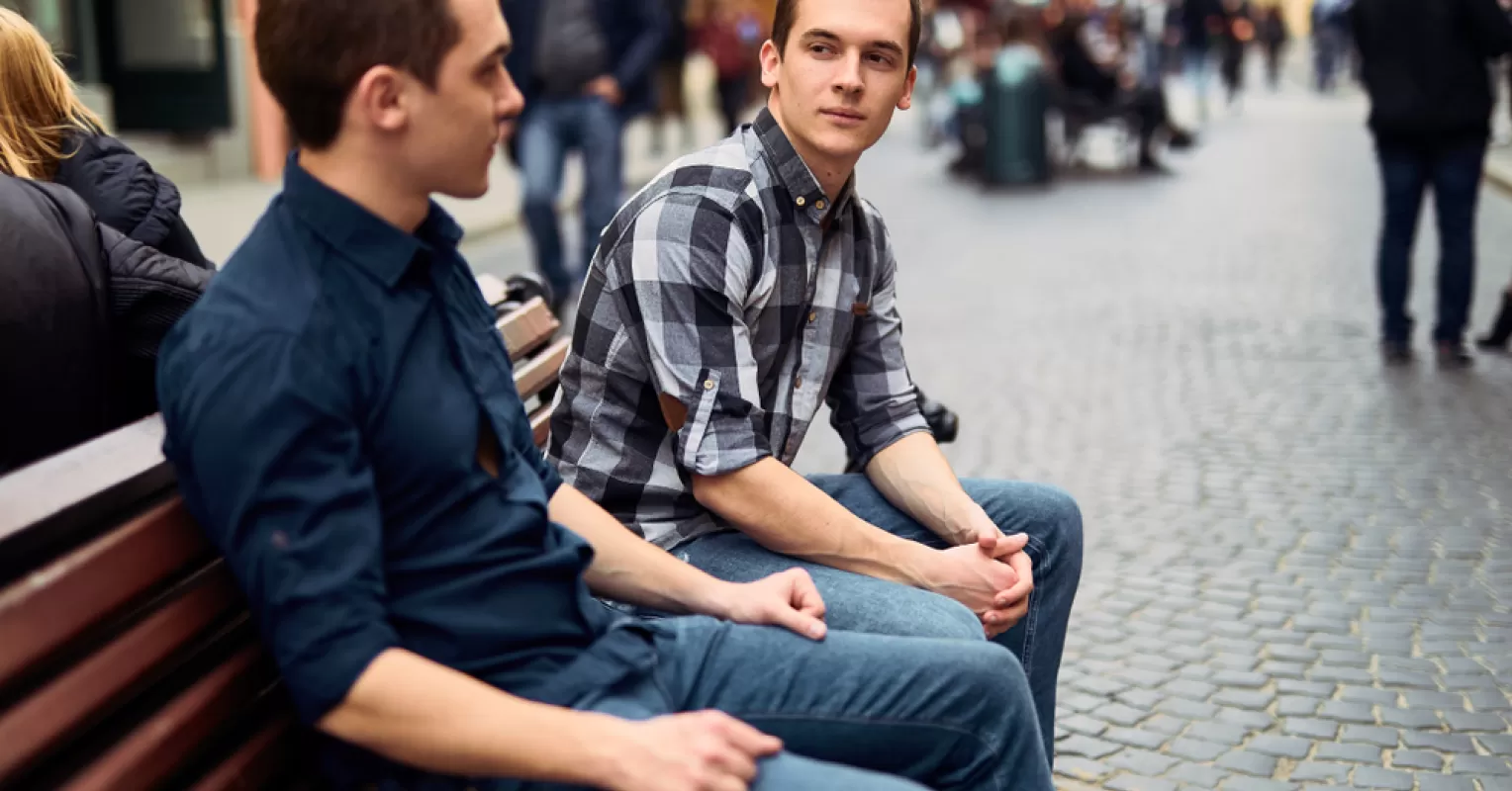 Individual hesitating to ask for help, reflecting emotional barriers in relationships