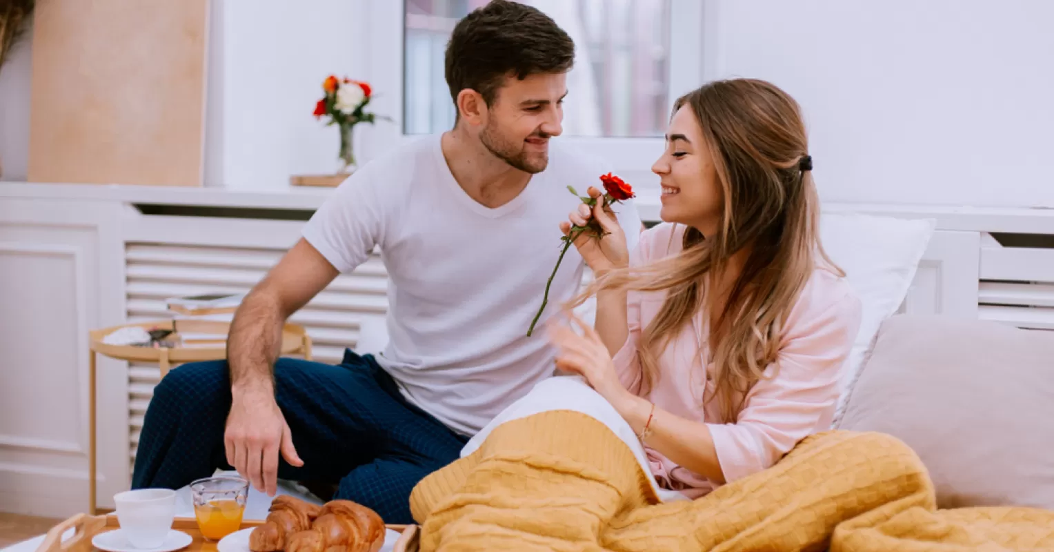Individual overwhelmed by affection, questioning why some people love-bomb in relationships