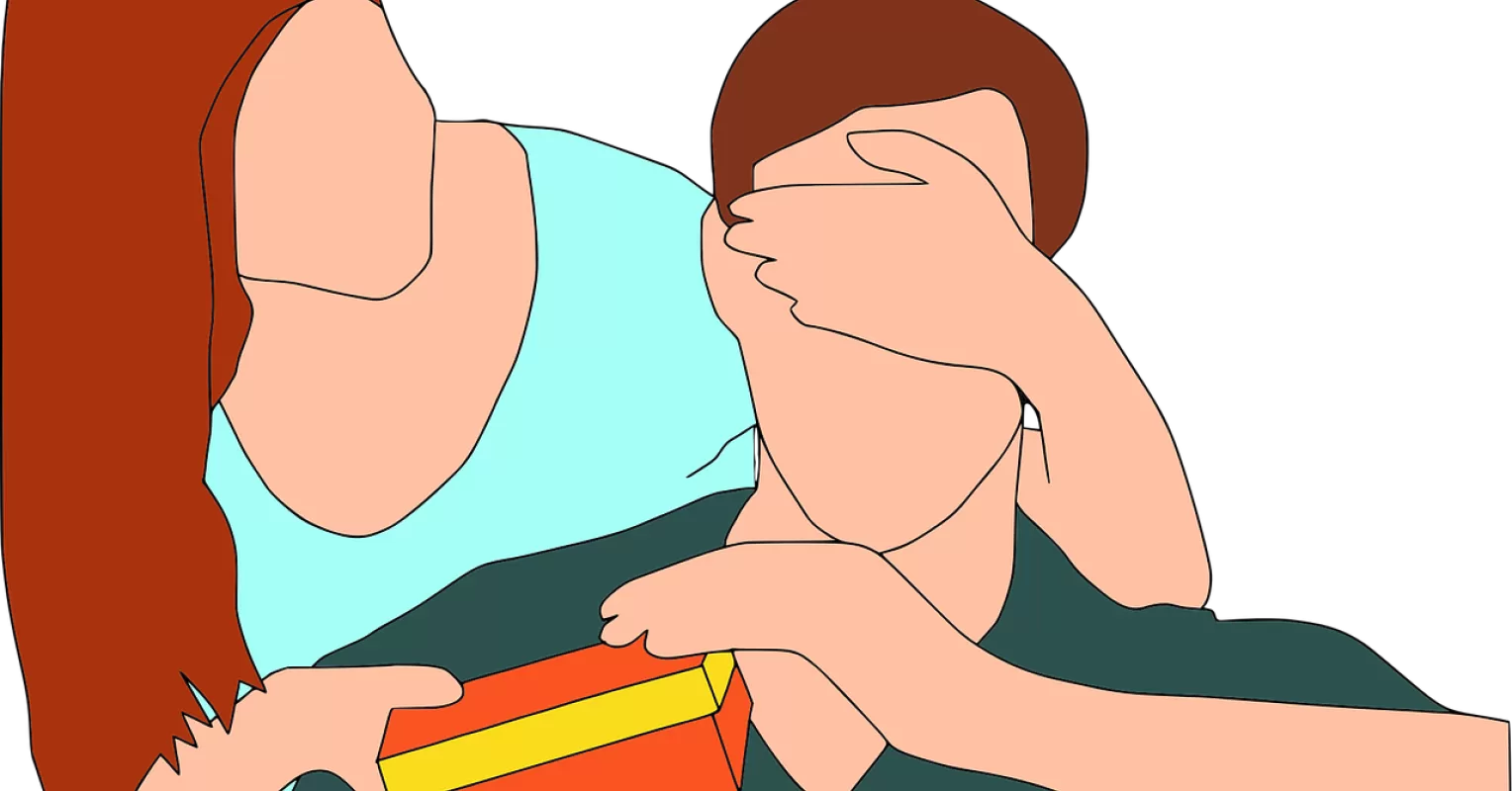 A thoughtful person considering emotional signals while selecting gifts for men