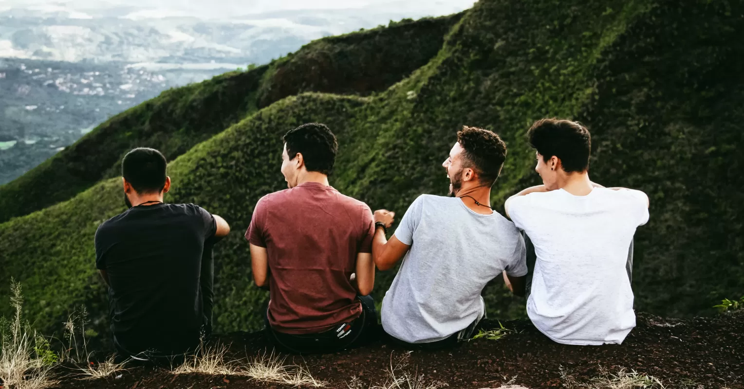 Group of friends engaging in deep conversation, enhancing their communication skills