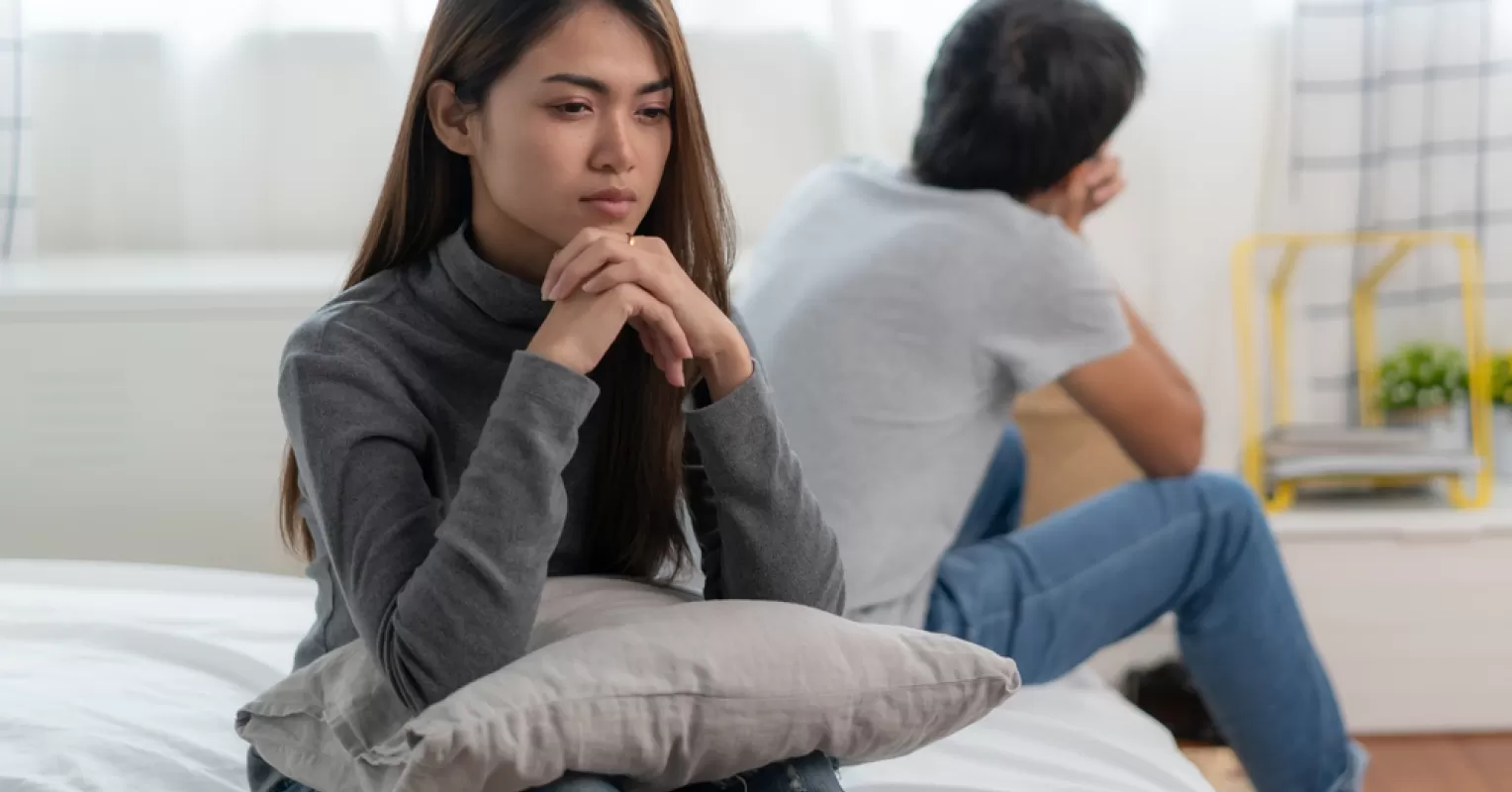 Couple discussing feelings while navigating communication challenges with an avoidant partner