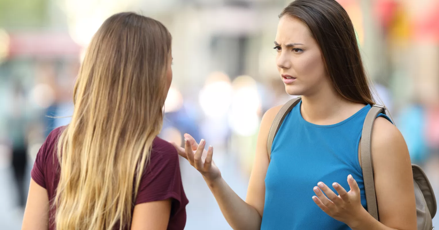 Person noticing subtle social behavior signals connected to how to deal with sensitive friends