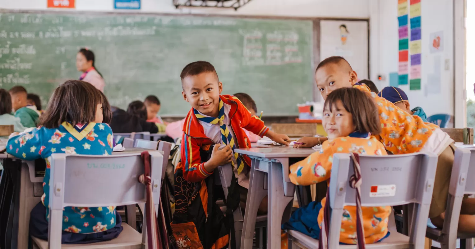 Teacher engaging students in a lively discussion to boost class participation