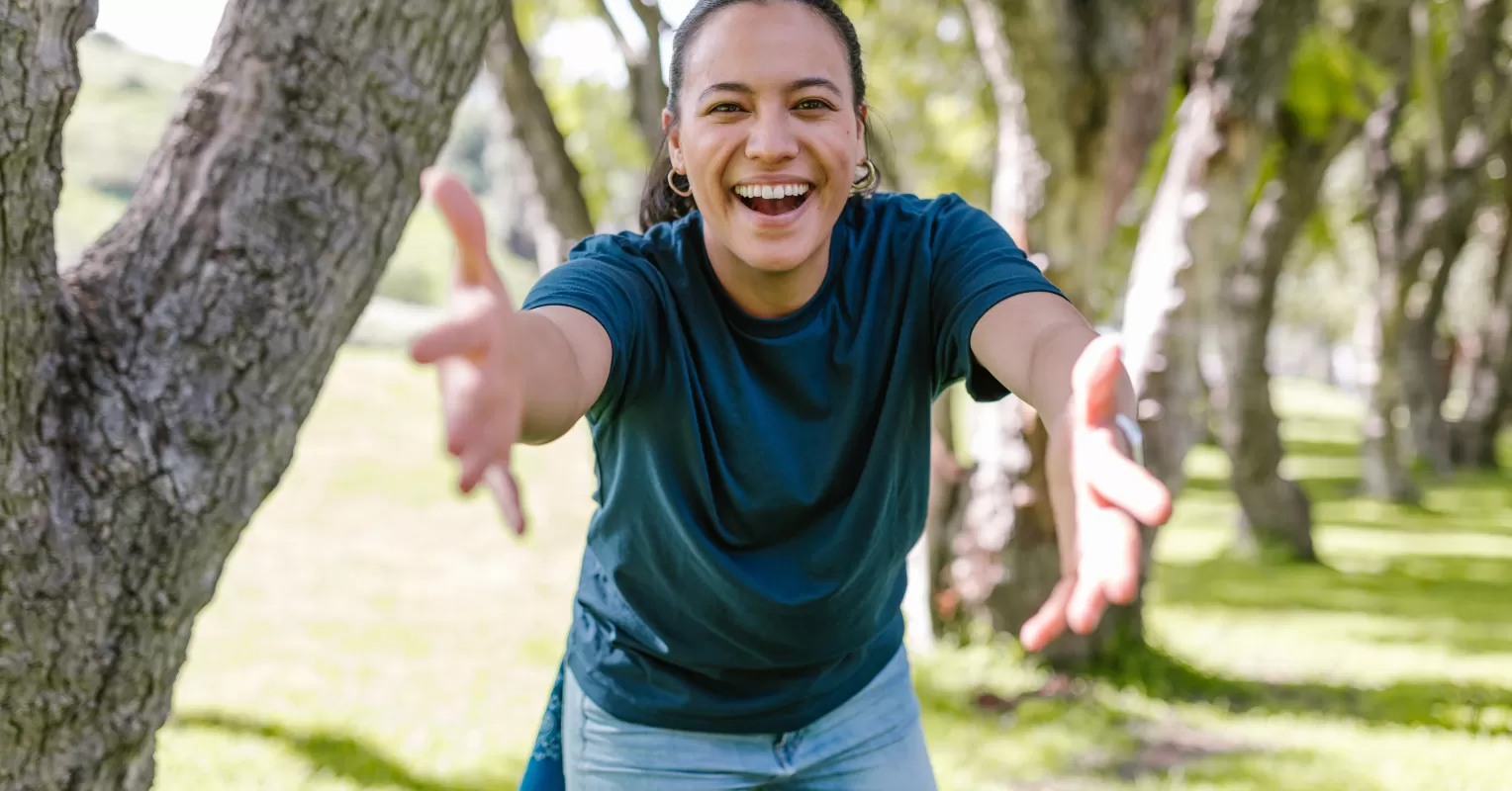 Group of friends engaging in a heartfelt conversation about positive influence and connection