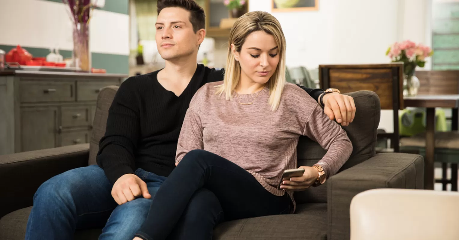 Couple engaging in open conversation to rebuild intimacy after infidelity