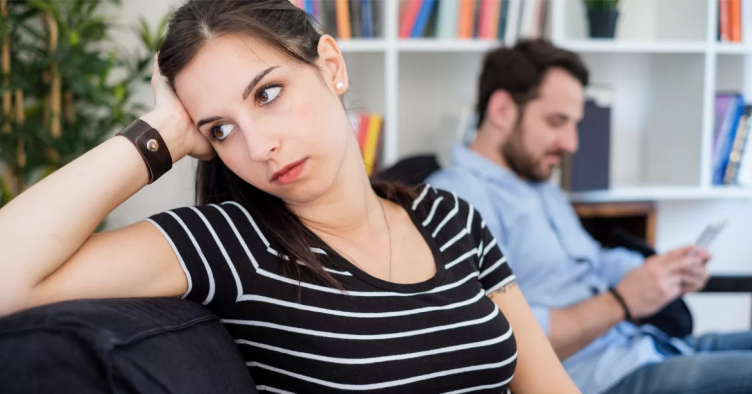 Individual engaging in self-reflection to rebuild self-esteem after a breakup