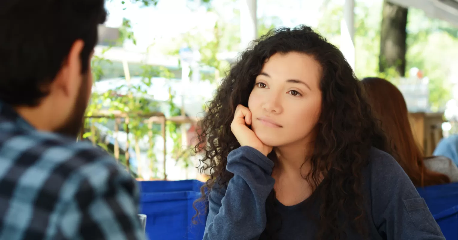 Person reflecting on emotional behavior and meaning connected to someone is not into you