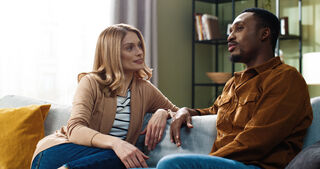 Couple engaged in open dialogue, enhancing trust through effective communication in their relationship