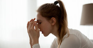 Betrayed partner contemplating next steps after discovering infidelity in a relationship
