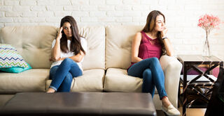 Two friends having a serious conversation about ending their friendship with care