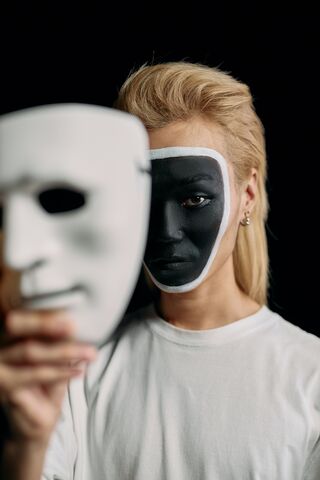 Individual contemplating the signs of emotional abuse and seeking ways to break the cycle