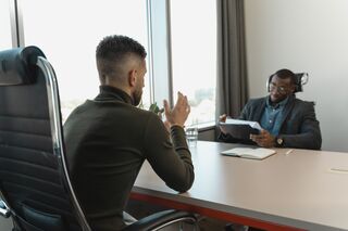 Two friends discussing feedback while maintaining a supportive and understanding atmosphere
