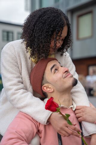 Man looking contemplative while discussing relationship signals about intimacy and interest in sex