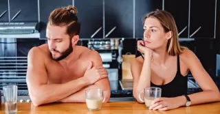 Individual contemplating the impact of suppressing emotions in relationships on their connection