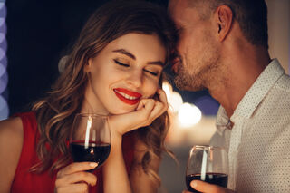 Person listening intently to a deep voice, reflecting on attraction and human behavior