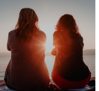 Two friends having a serious conversation about ending their long-term friendship with understanding.