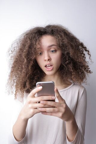 Person reflecting on emotional behavior and meaning connected to someone catfishes you