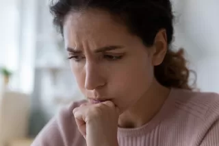 Individual contemplating choices, reflecting on what it means when someone is indecisive
