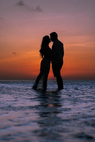 Individual captivated by another, reflecting on the complexities of human behavior and attraction