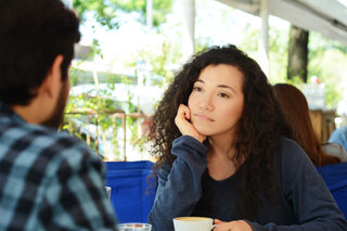 Person reflecting on emotional behavior and meaning connected to someone is not into you