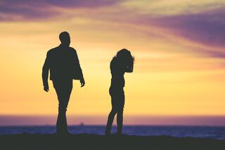 Individual avoiding responsibility during a conversation about relationship accountability