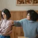 Two friends having a serious conversation about ending a long-term friendship with understanding.