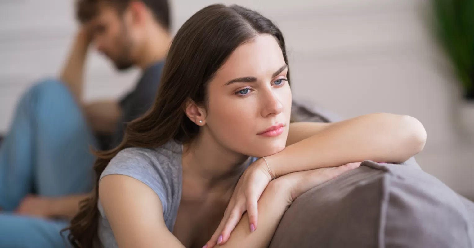 Individual contemplating the emotional implications of infidelity and what cheating reveals about a person