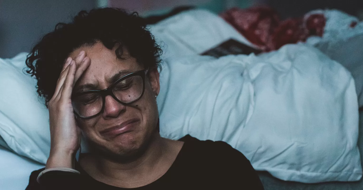Person reflecting on emotional behavior and meaning connected to what does it mean to be emotionally abused