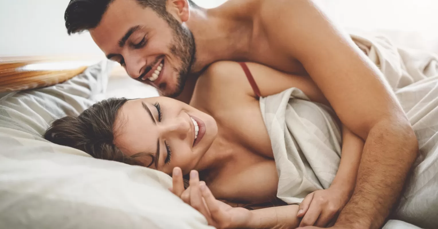Couple sharing an intimate moment, reflecting on what it means to be sexually satisfied