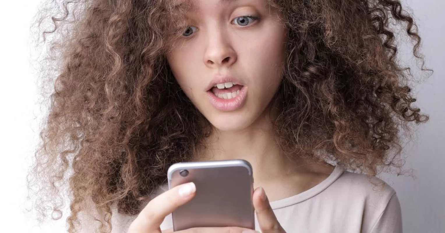 Person reflecting on emotional behavior and meaning connected to someone catfishes you