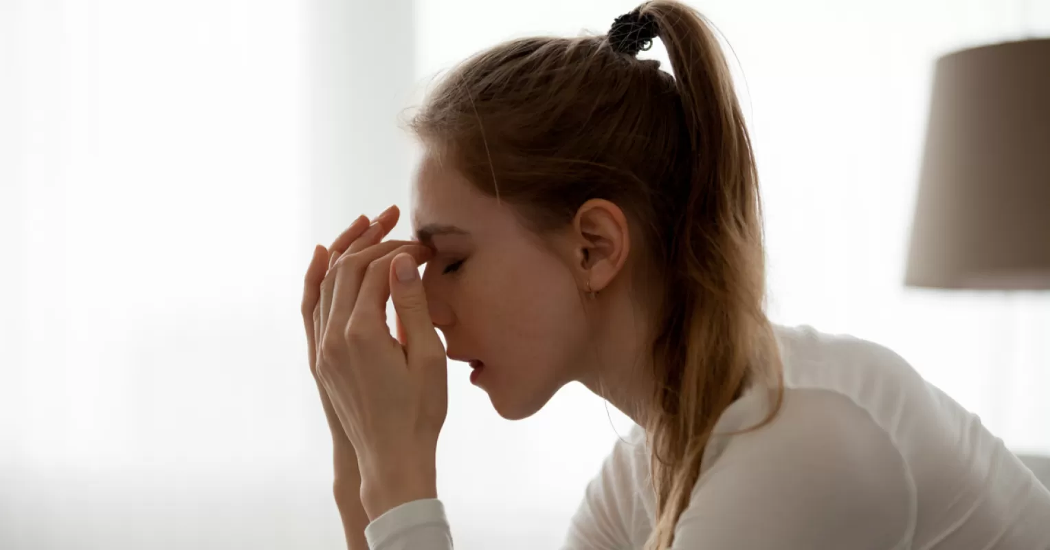 Betrayed partner contemplating next steps after discovering infidelity in a relationship