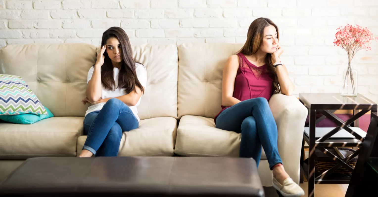 Two friends having a serious conversation about ending their friendship with care