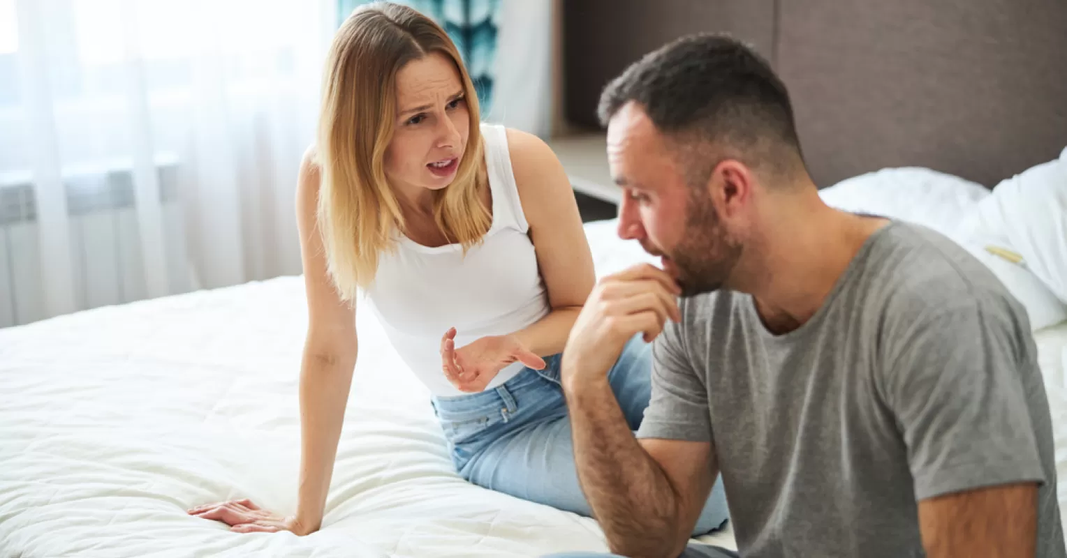 Couple discussing small disagreements, revealing deeper relationship signals and emotional patterns