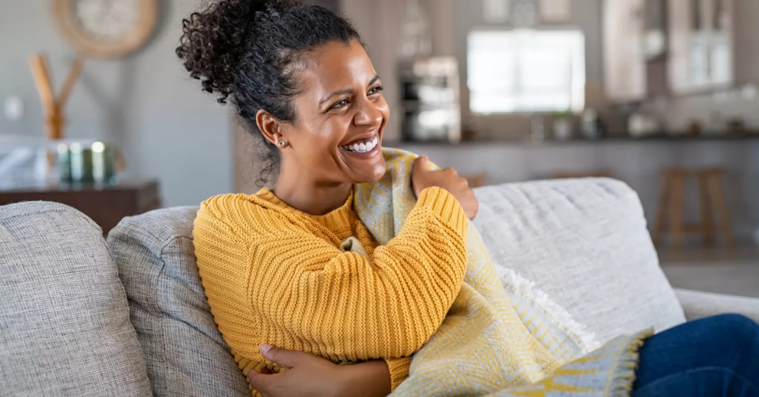 Person experiencing disconnection from their body while reflecting on emotional signals