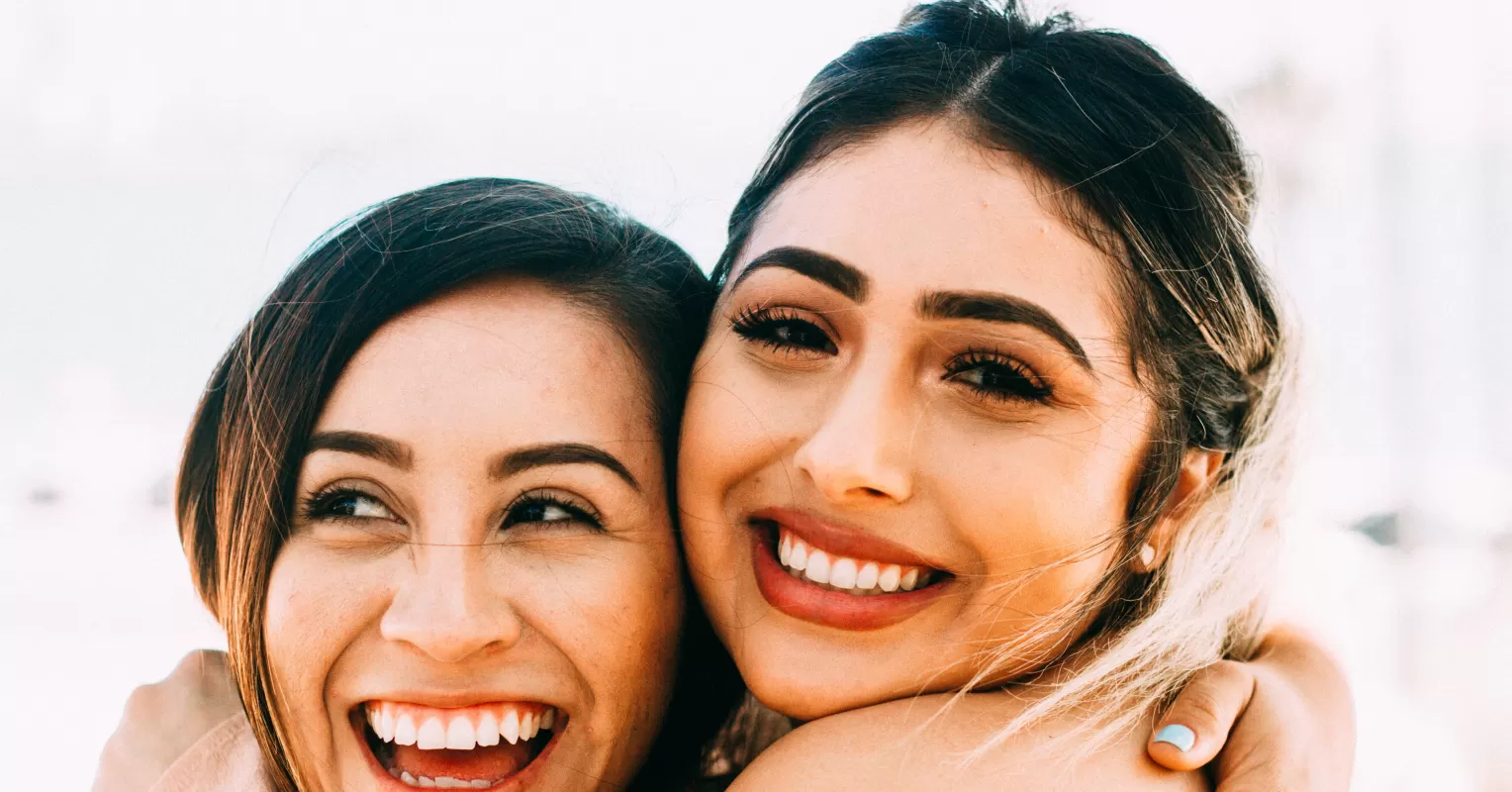 Individual feeling neglected while observing friends interact, highlighting relationship signals of care