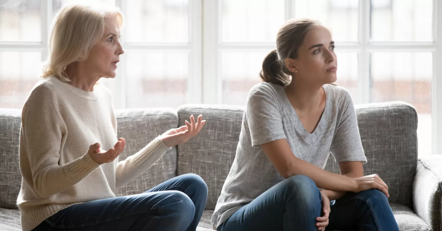 Individual avoiding responsibility during a conversation about relationship accountability