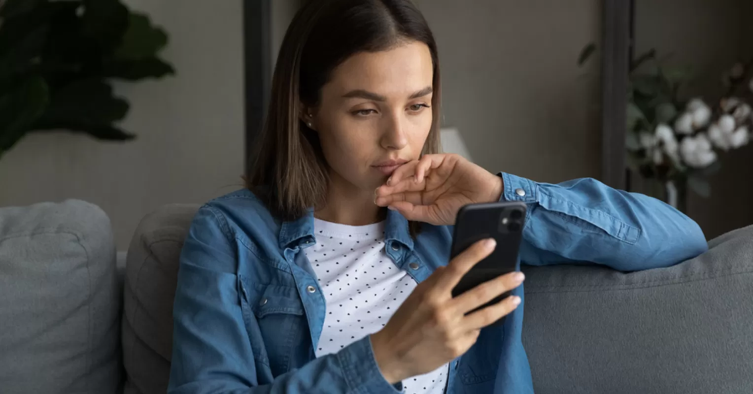 Individual contemplating the emotional pain of ghosting versus rejection in relationships